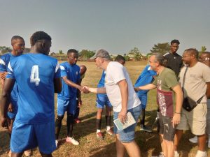 The Scouts exchanging pleasant with players